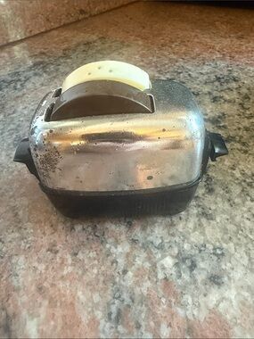 Stainless Steel and Black Handheld Kitchen Butter Spreader